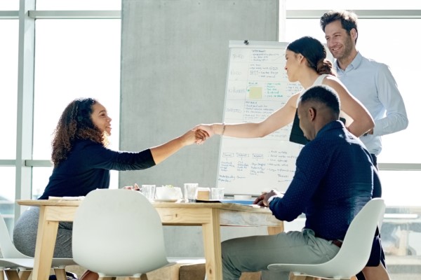 happy employees in a meeting