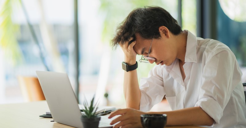 Stressed employee at work