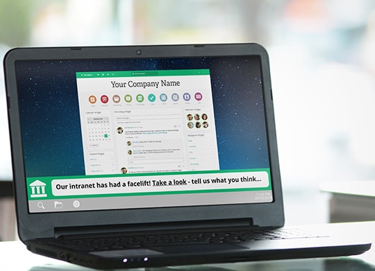 company intranet ticker update on laptop