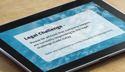 legal challenge alert on tablet